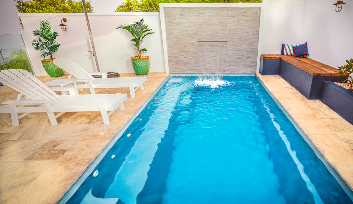 Leisure Pools Harmony composite swimming pool with built-in bench seat