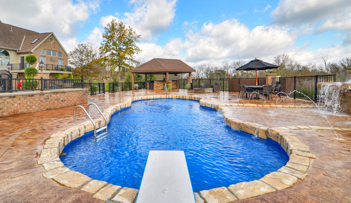 Leisure Pools Mediterranean composite freeform diving pool with wrap-around bench