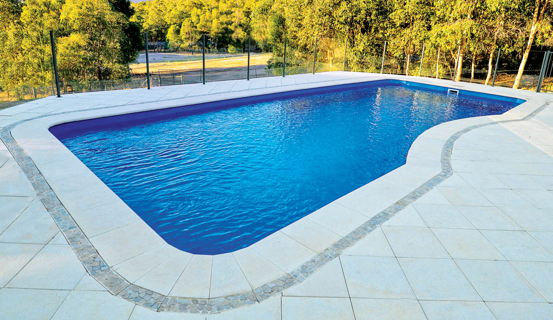 Leisure Pools Moroccan large inground swimming pool with stairs and spa nook