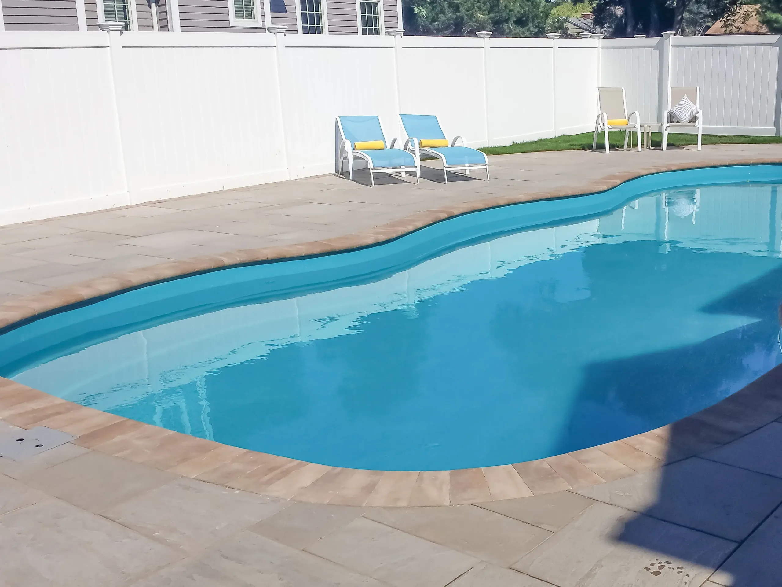 020323-LanscapingPrivacy-2 Fence providing privacy for inground fiberglass swimming pool