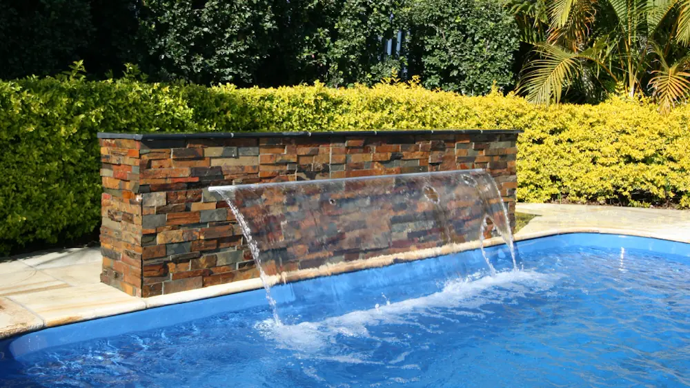 042624-ElevatePoolWaterFeatures-2Waterfall Serenity waterfall: one of Leisure Pools' water features
