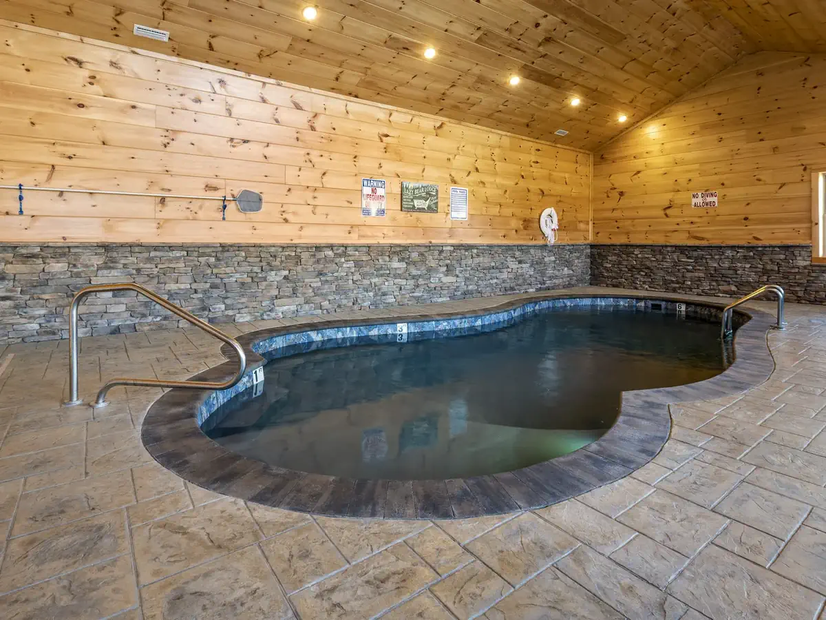 052523-LPMayPOM-1 This indoor fiberglass pool installation near Pigeon Forge, Tennessee stands out as a true masterpiece.