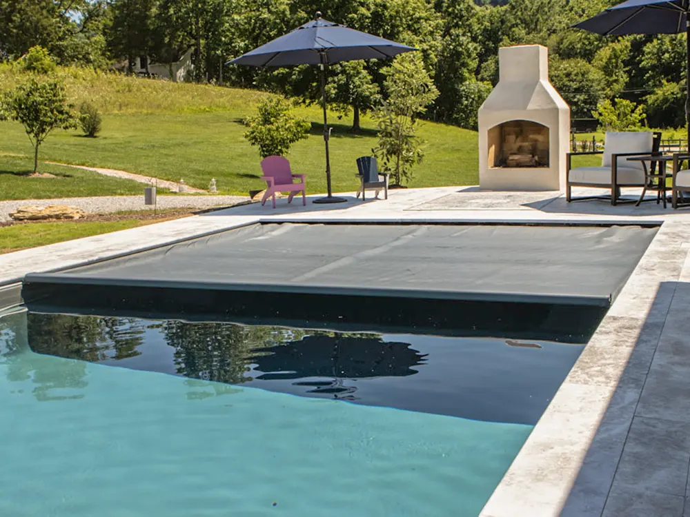 102123-IntegraPoolCovers-1 An automatic pool cover adds an extra layer of safety