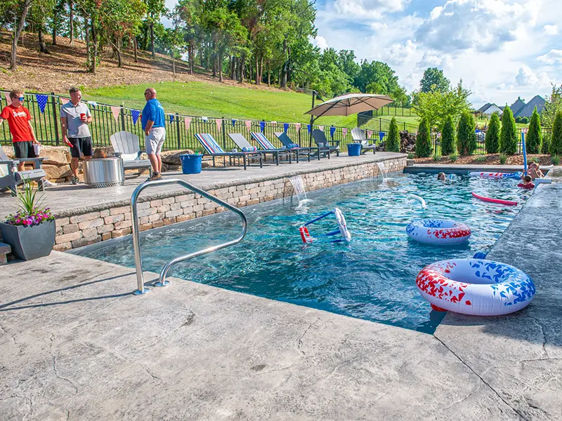 121922-LPPooloftheMonth-2 Leisure Pools Pinnacle 40 fiberglass inground swimming pool in Graphite Gray