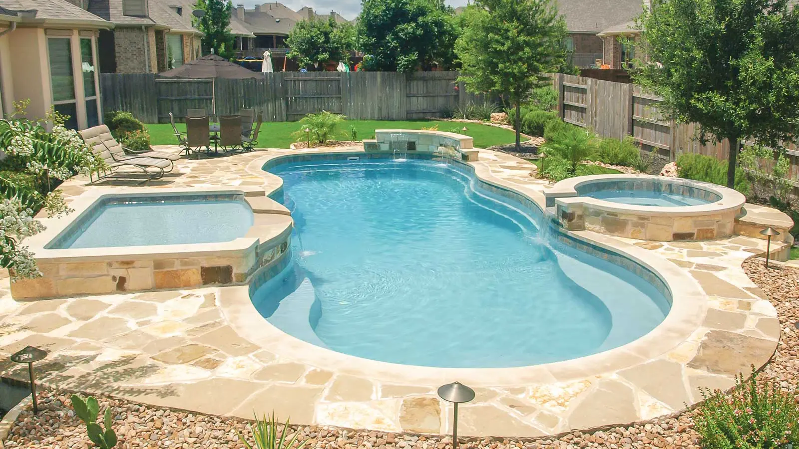 Leisure-Pools-Caribbean-fiberglass-pool The Caribbean, a fiberglass pool with a wraparound entry bench