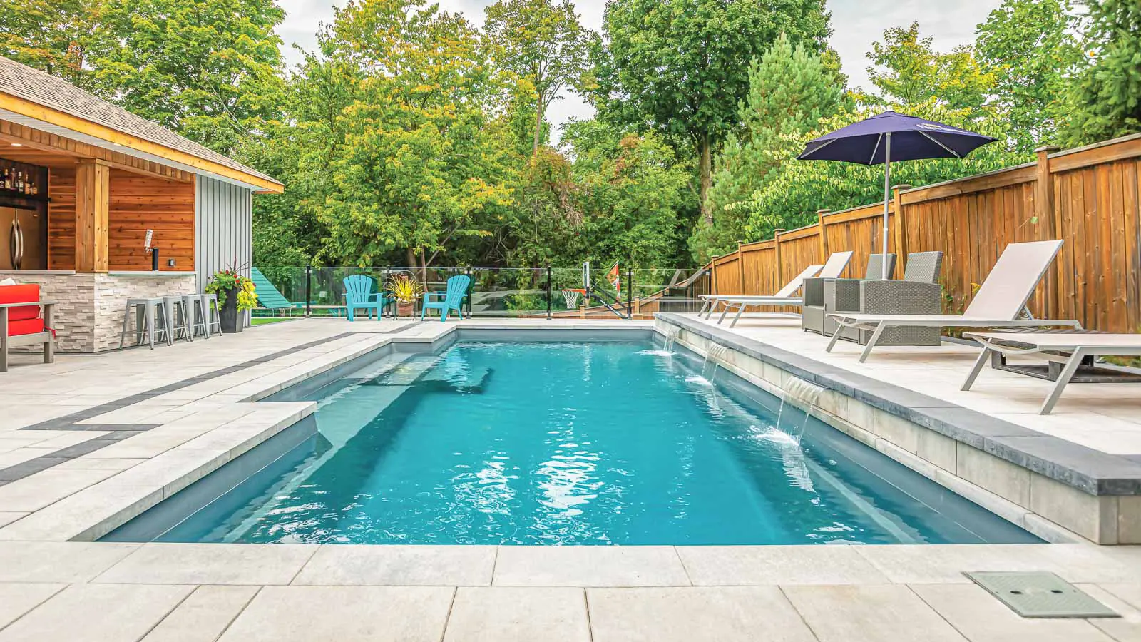 Leisure-Pools-Elegance-fiberglass-pool The Elegance, a fiberglass pool with a cut-out step design