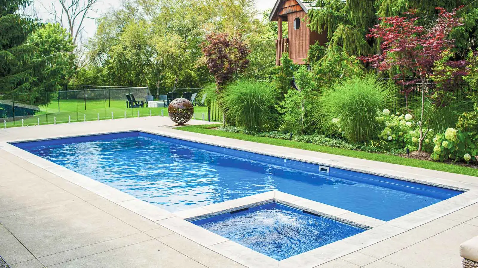 Leisure-Pools-Icon-fiberglass-pool The Icon, a fiberglass diving pool with built-in spa and tanning ledge