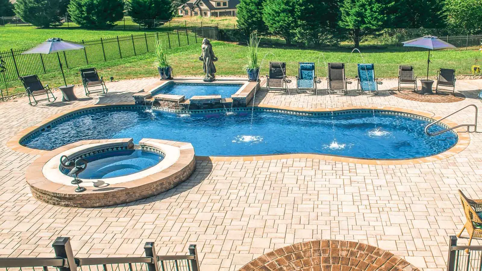 Leisure-Pools-Mediterranean-fiberglass-pool The Mediterranean, a fiberglass pool with a wraparound bench and incredible add-on design options