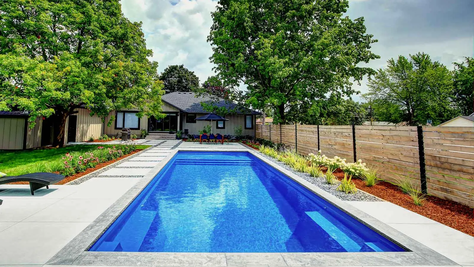 Leisure-Pools-Pinnacle-fiberglass-pool The Pinnacle, a fiberglass pool with a full width splash pad