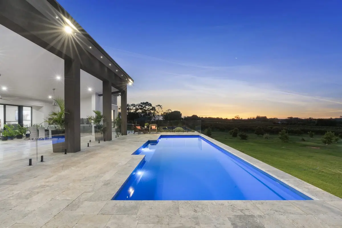 LeisurePoolsAU_Elegance_12_SapphireBlue_Riverscape_POTMJune_2021_2 backyard swimming pool lights