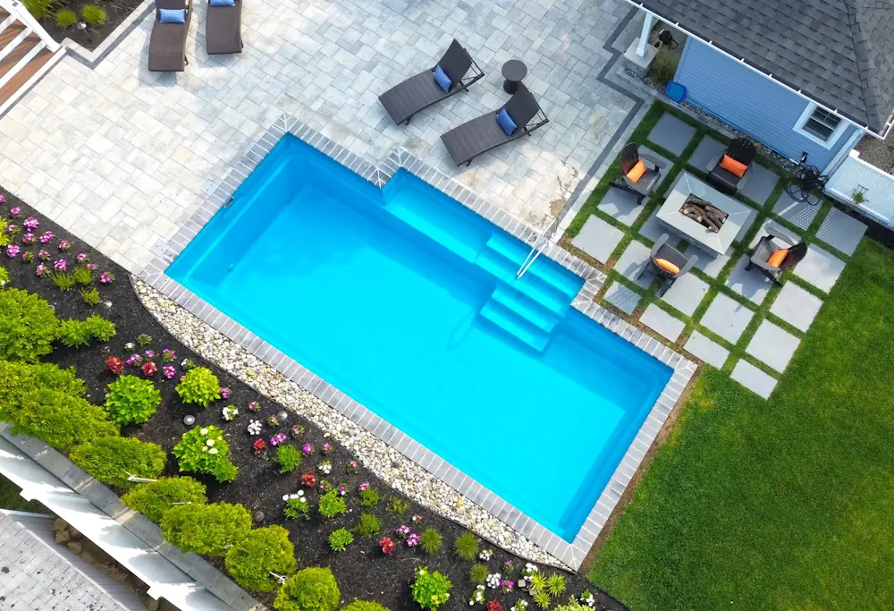 PURAVIDA_TABAK_ELEGANCE2 copy A Leisure Pools masterpiece adds a touch of elegance to this ranch home